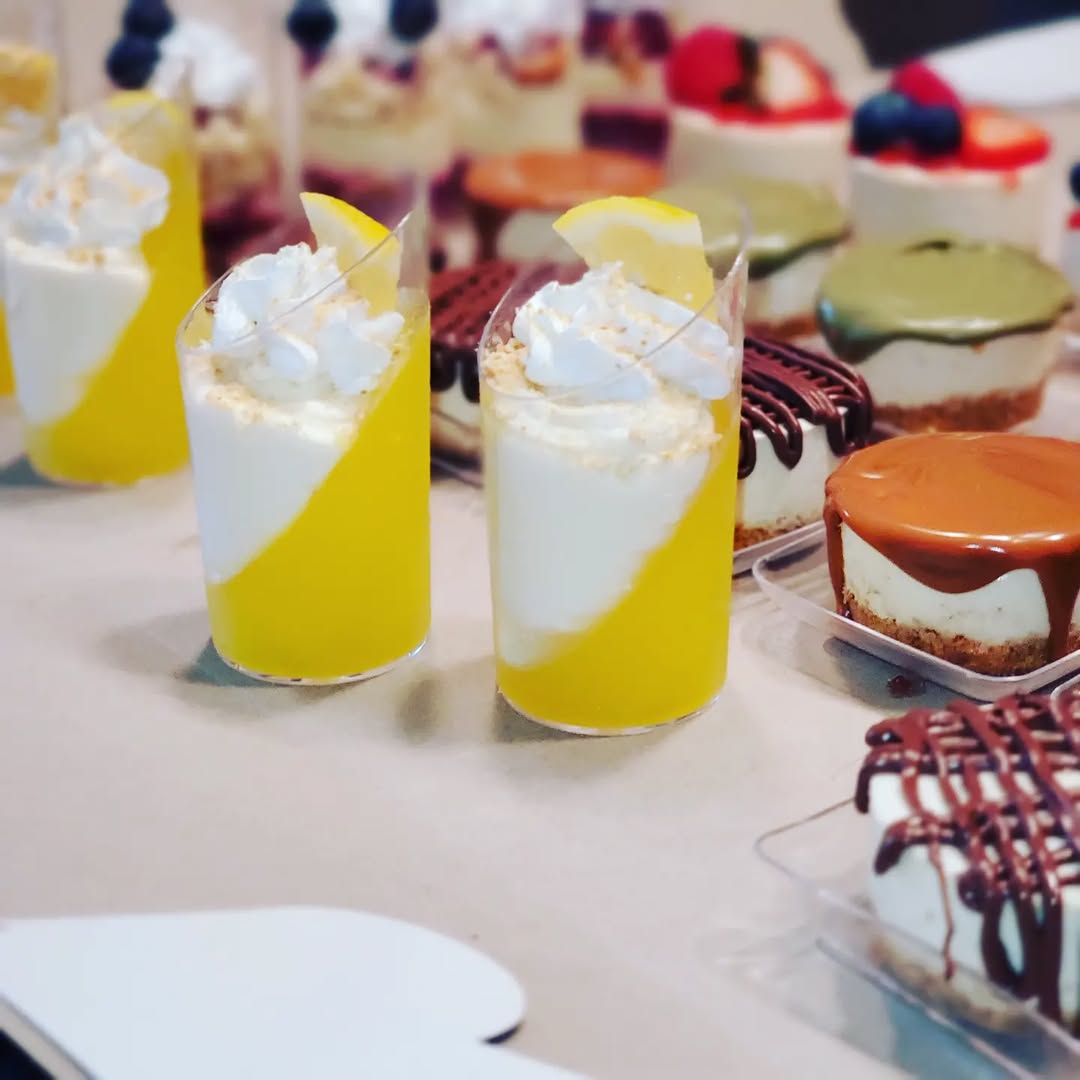 Colorful drinks and assorted desserts for a graduation party